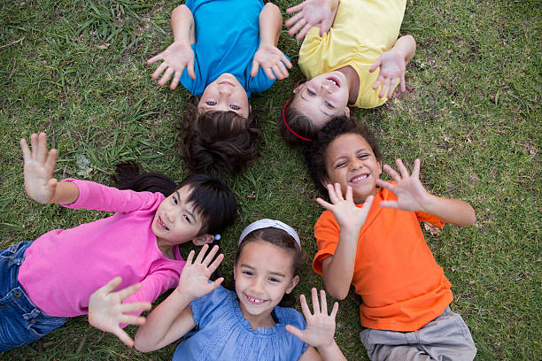 istock Little children having fun in park 471122458