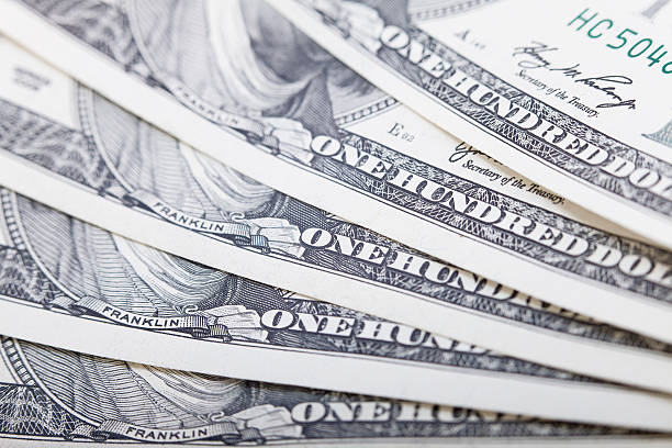 istock Hundred dollars banknote closeup, money background 471123384