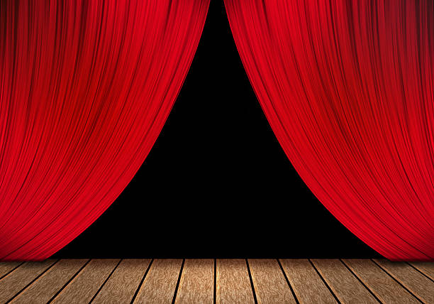 istock opening red curtain and wood stage background. 471123568