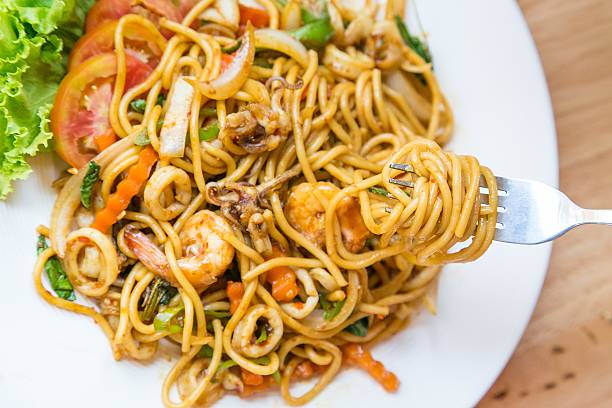 istock Spaghetti spicy seafood on plate 471125352