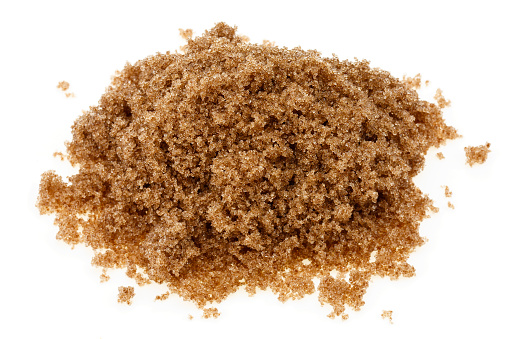 A small pile of demerara-style brown sugar.