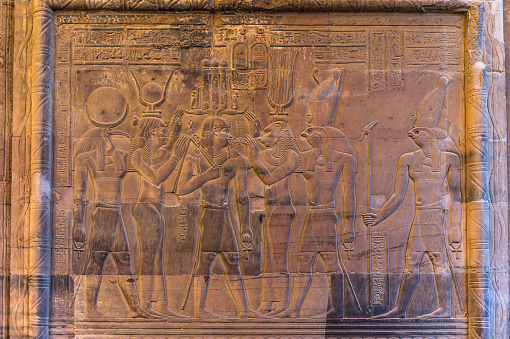 Well preserved authentic real Egyptian hieroglyphs on the wall in the Sobek temple in Kom Ombo, Egypt