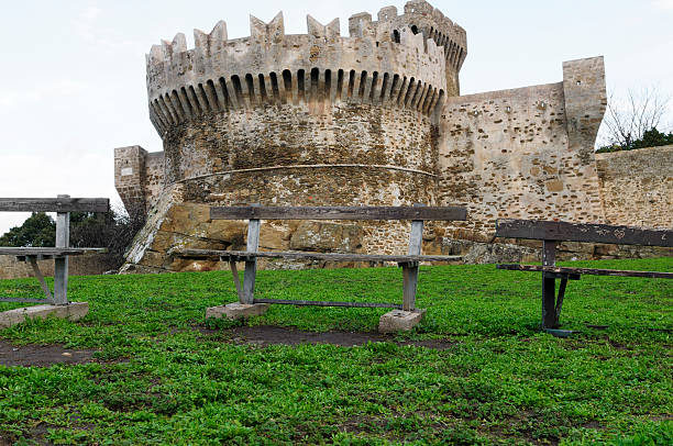 istock Benches and ancient fortress 471127139