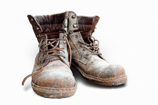 istock Pair of very old boots 471127507