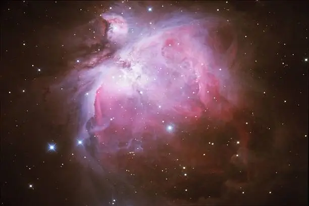 Photo of Orion Nebula in space with stars