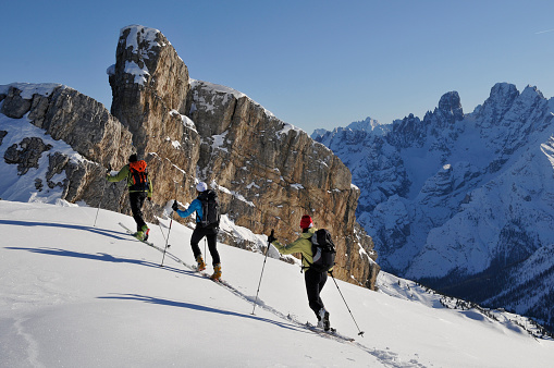 Group of alpine touring skiers on the big Verra Glacier
