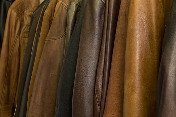 istock hanging a lot of leather jackets 471129114