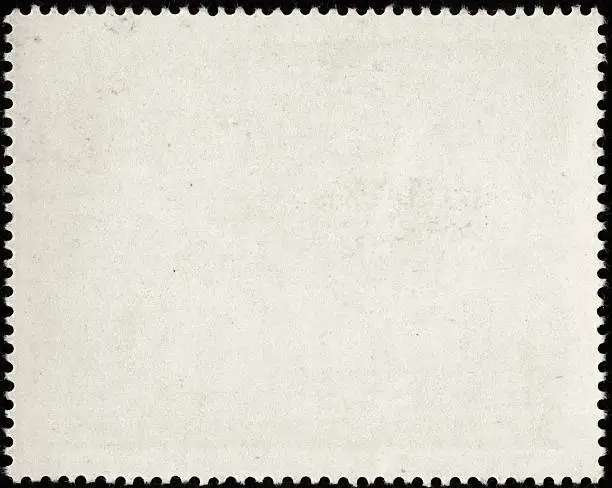 Photo of Blank white postage stamp with serrated edges