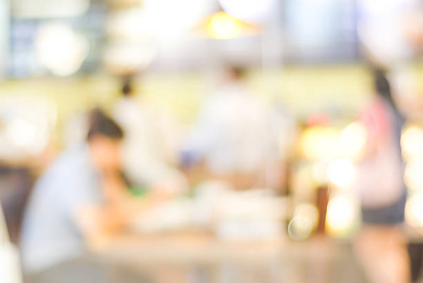 istock Blur cafe with people and bokeh light background 471132532