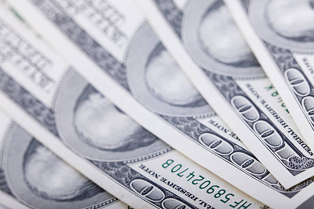 istock Abstract of One Hundred Dollar Bills with Narrow Depth Field 471132600