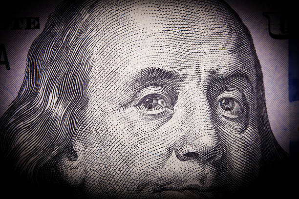istock Portrait of Benjamin Franklin from one hundred dollars bill new 471132616