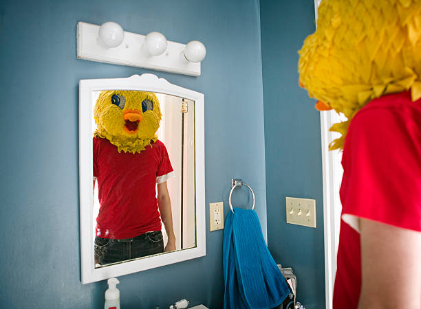 young man with bird / chicken mask - tavuk kostümü stok fotoğraflar ve resimler