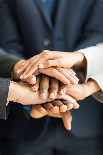 istock business people hands together 471134134