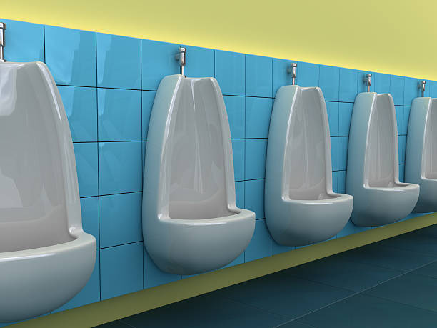 urinals in line stock photo