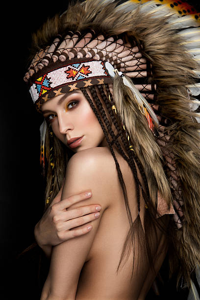 istock Beautiful ethnic lady with roach on her head 471135138