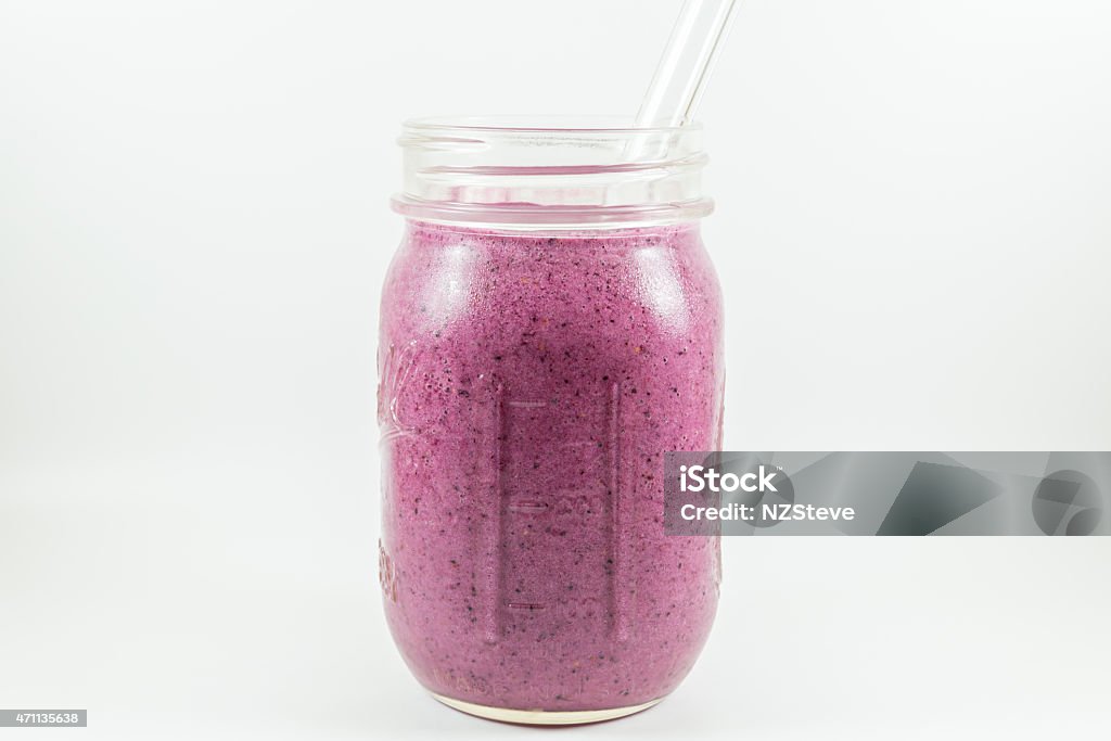 Blueberry, Raspberry, Strawberry and Banana Smoothie Blueberry, Raspberry, Strawberry and Banana Smoothie with Milk, Water, Protein, Honey and more 2015 Stock Photo