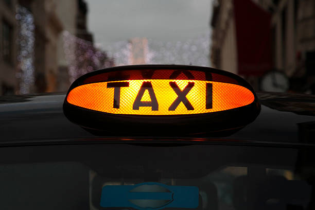 Taxi sign View similar photos black taxi stock pictures, royalty-free photos & images