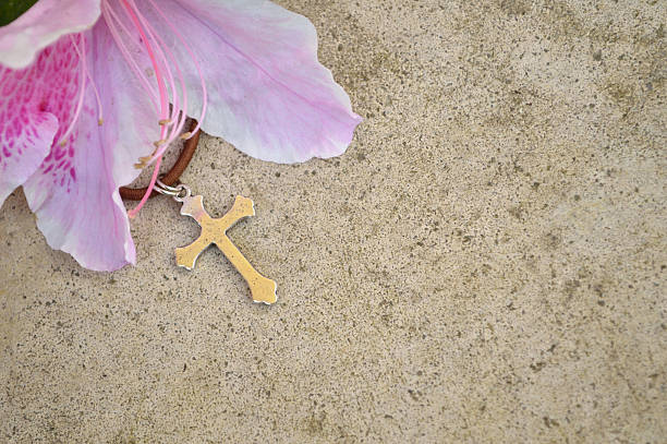 Cross and flower background against concrete gray