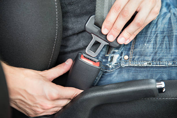 istock Man Fastening Seat Belt In Car 471138868