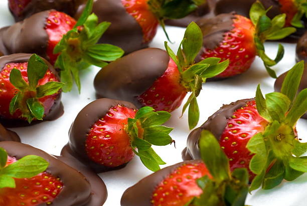 istock Plate of chocolate coated strawberries 471138925