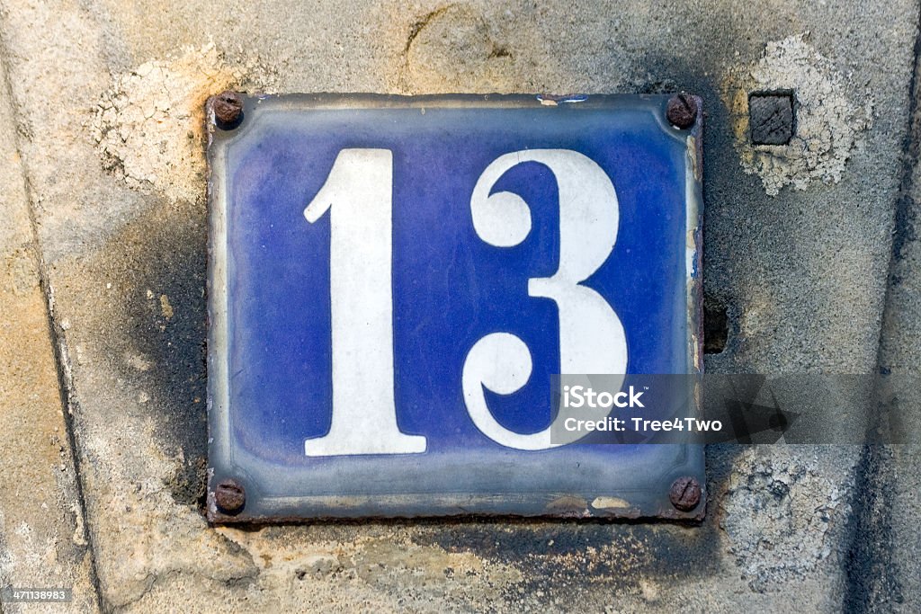 Number 13 House number 13. Focus on the number. Architectural Feature Stock Photo