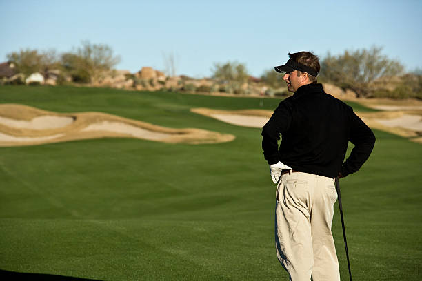 istock Male Golfer Waiting on Course 471139165