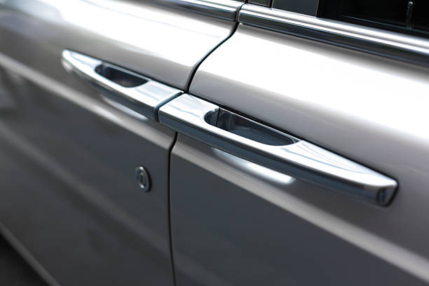istock door handle of a luxury silver limosine 471142667