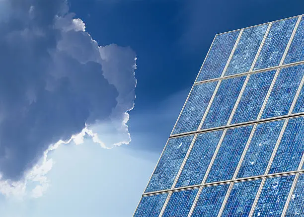 Solar panel against cloudscape