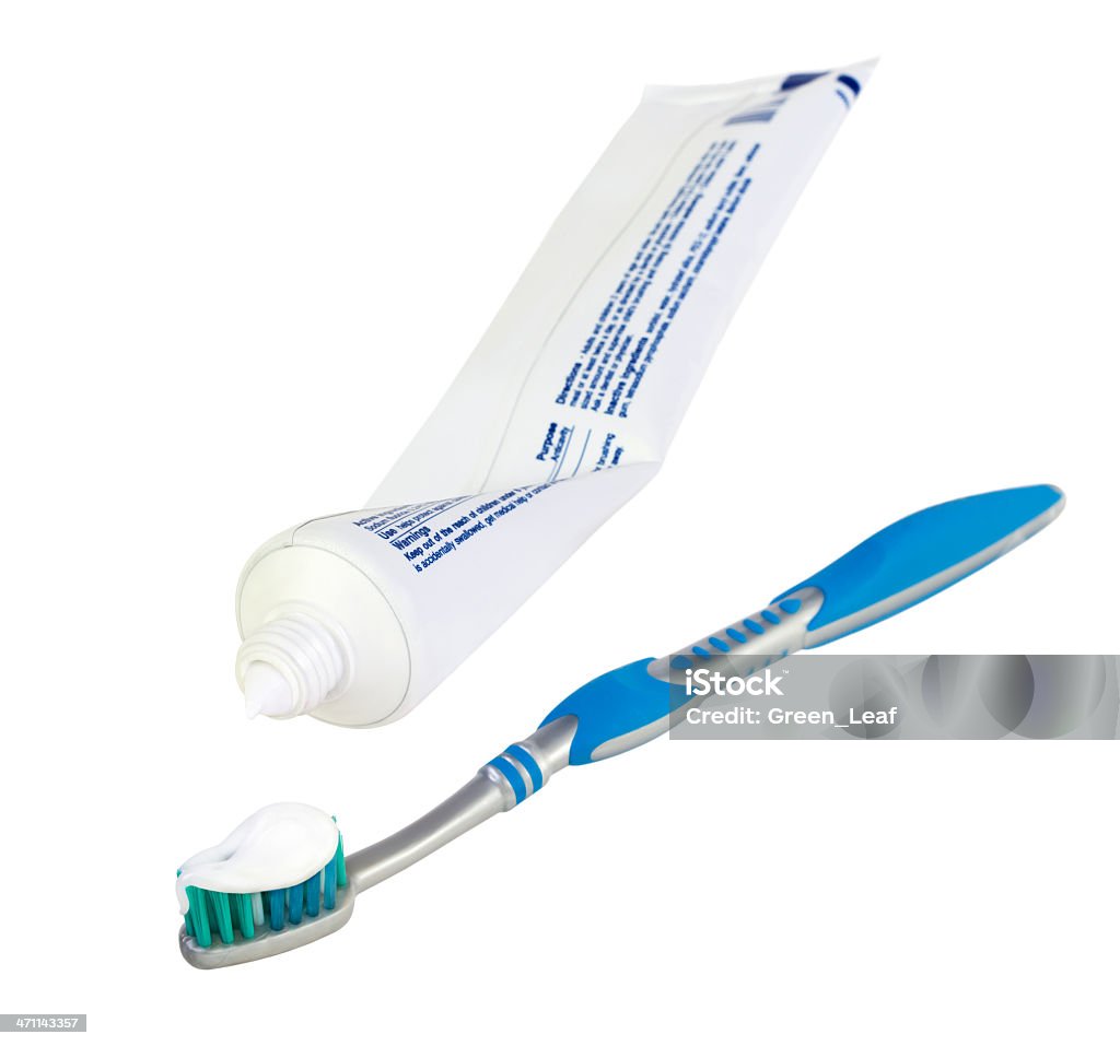Toothbrush and toothpaste Toothbrush and toothpaste isolated on white. Shallow depth of field. Toothpaste Tube Stock Photo