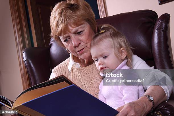 Reading With Grandma Stock Photo - Download Image Now - 12-17 Months, 12-23 Months, Adult