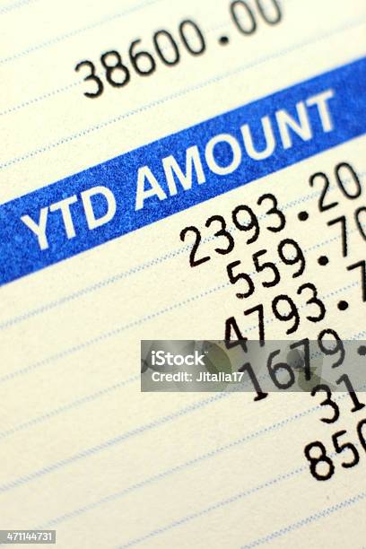 Paycheck With Taxes Deducted Close Up Photo Stock Photo - Download Image Now - Paycheck, Ticket Stub, Wages