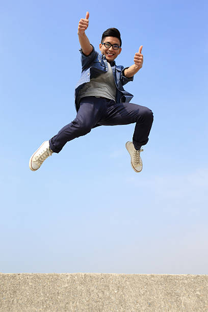 istock Happy man run and jump 471145554