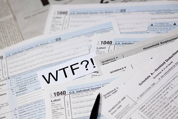 istock Taxes tax form US 1040 with WTF Expression 471147301