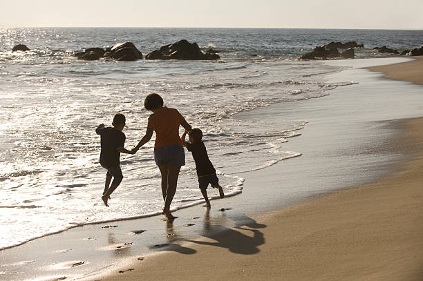 istock Playful mother and sons 471147883