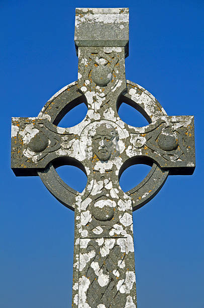 istock Celtic cross at cemetery in Ireland 471148283