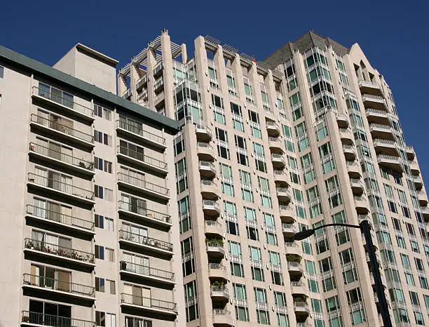 Apartments along Wilshire Blvd in Westwood, CA where rents are expensive in abstract