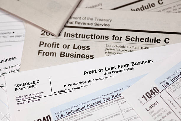 programação c lucro ou prejuízo de negócios formulário 1040 - tax tax form finance small business - fotografias e filmes do acervo