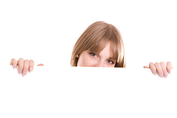 istock Young girl with blank sign 471150247