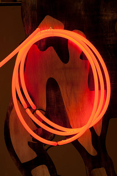 istock Neon Lasso, Sign, Light, Circle Pattern, Spiral, Orange Glow 471151515