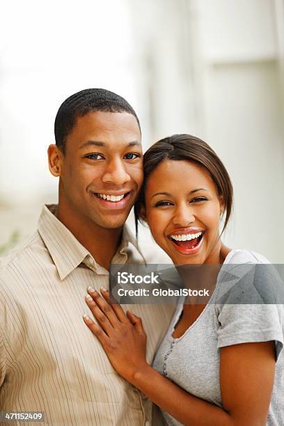 Romantic Young Couple Smiling Stock Photo - Download Image Now - 20-24 Years, 20-29 Years, Adult