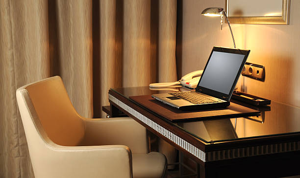 Close up of orange chair in a board room without people.