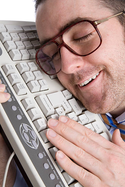 istock Fool businessman in love with keyboard 471153961