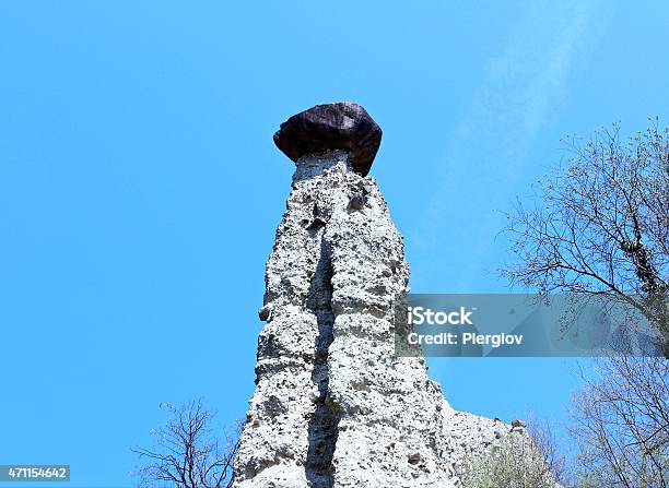 Earth Pyramid Large Rock Hat Natural Phenomenon Stock Photo - Download Image Now - 2015, Art and Craft Product, Bank Deposit Slip