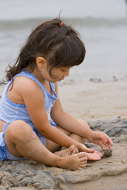 istock Young Child on the Beach 471155381