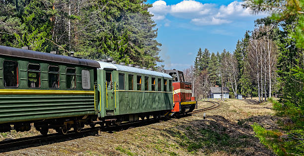 istock Passenger train on old narrow-gauge railway. 471155876