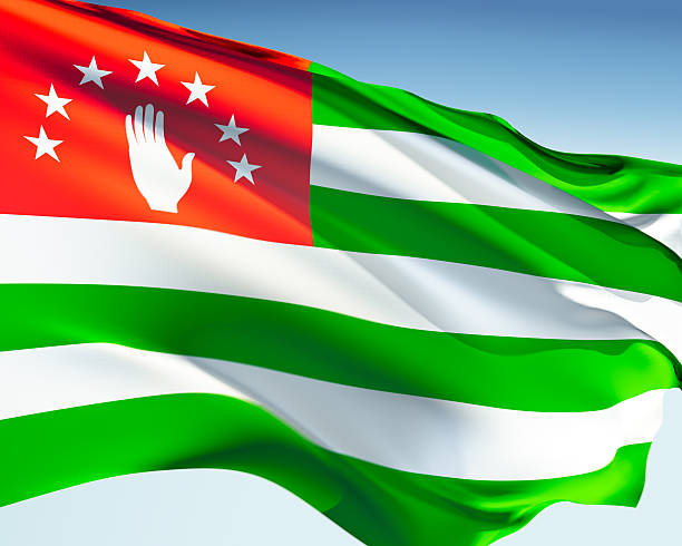Abkhazian flag waving in the wind. Elaborate rendering including motion blur and even a fabric texture (visible at 100%).