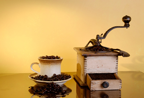 Still life of coffee grinder and cups cersamica Art decoration Vietri in Amalfi Coast, Italy