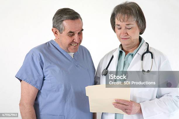 Doctor Explaining To Patient Stock Photo - Download Image Now - Accidents and Disasters, Adult, Adults Only