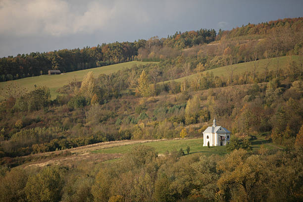 istock white chappel standing on the hill in southern Poland 471158751