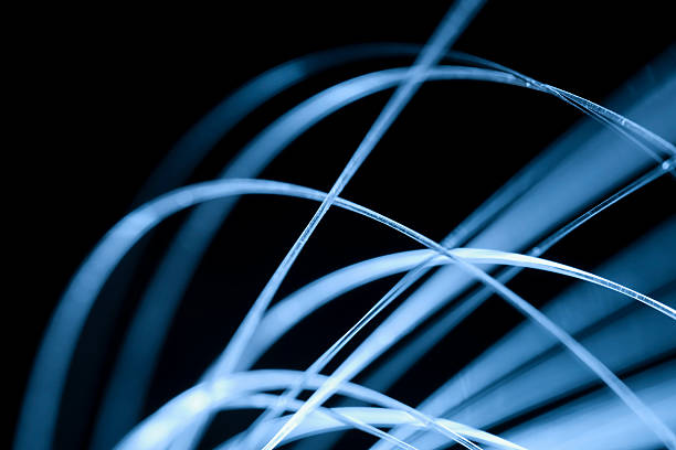 Abstract macro of fiber optics bending the light.